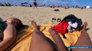 Hands free cumming on the beach